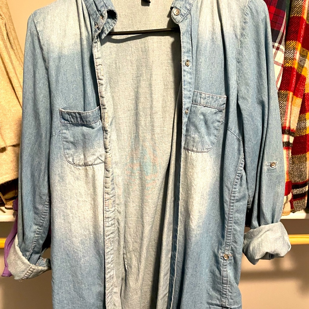 Light weight, medium, jean jacket.